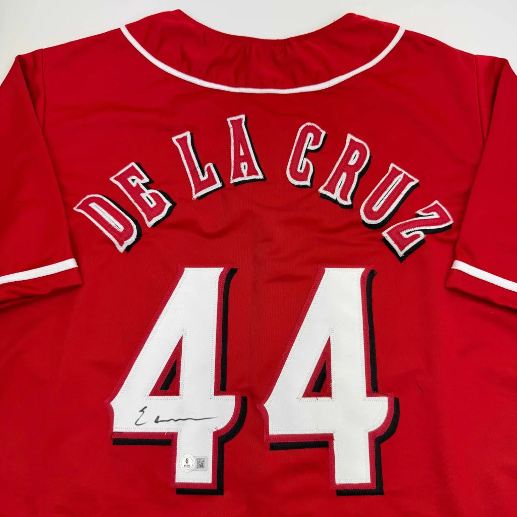 Autographed Elly De La Cruz custom jersey with red baseball design, number 44, Beckett COA