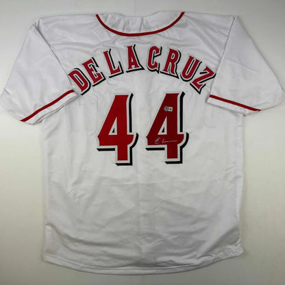 White custom baseball jersey with red and black trim for collectible fans of professional sports league