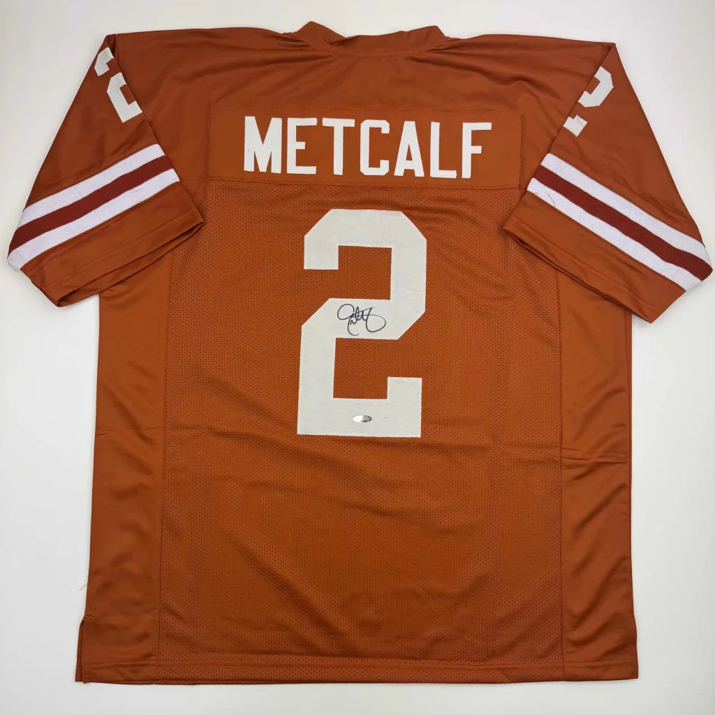 Autographed Eric Metcalf Texas Orange College Football Jersey Beckett BAS COA | Hall of Fame Sports Memorabilia | vintageantiquesgifts.com