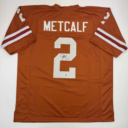 Autographed Eric Metcalf Texas Orange College Football Jersey Beckett BAS COA | Hall of Fame Sports Memorabilia | vintageantiquesgifts.com