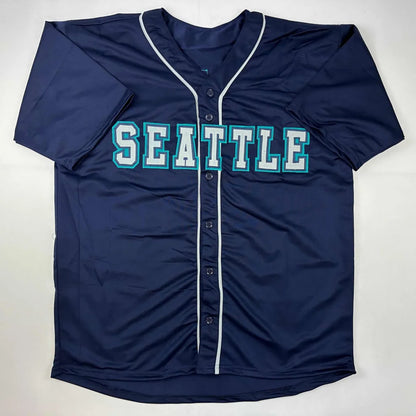 Navy blue custom jersey with SEATTLE in teal and white for professional sports fans