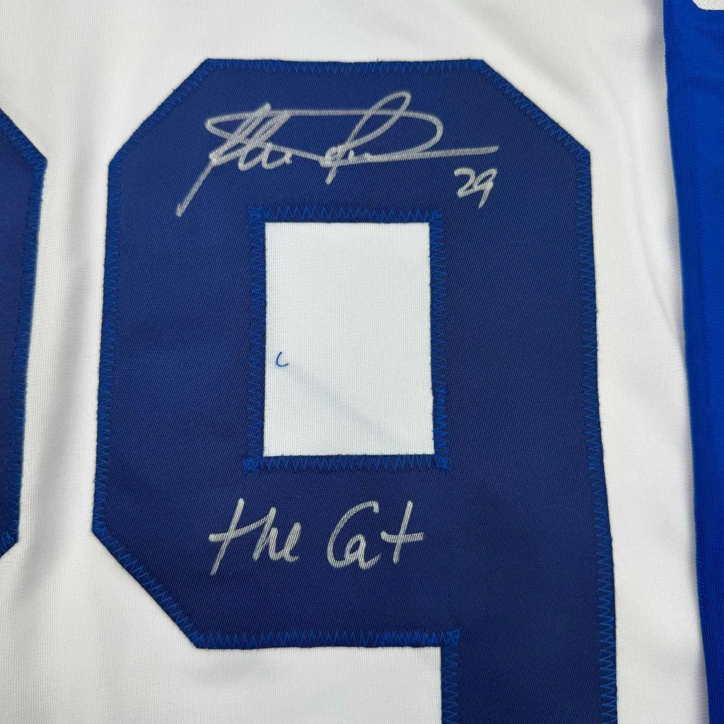 Autographed Felix Potvin Toronto Maple Leafs white custom jersey with blue number nine patch and silver signatures
