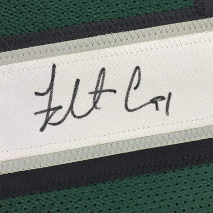 Autographed green custom jersey from a professional sports league collectible
