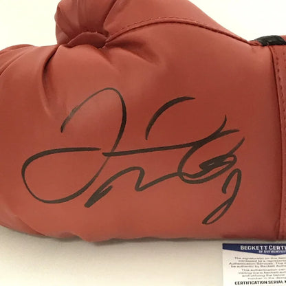 Red boxing glove with black autograph, authentic third party authentication guarantee