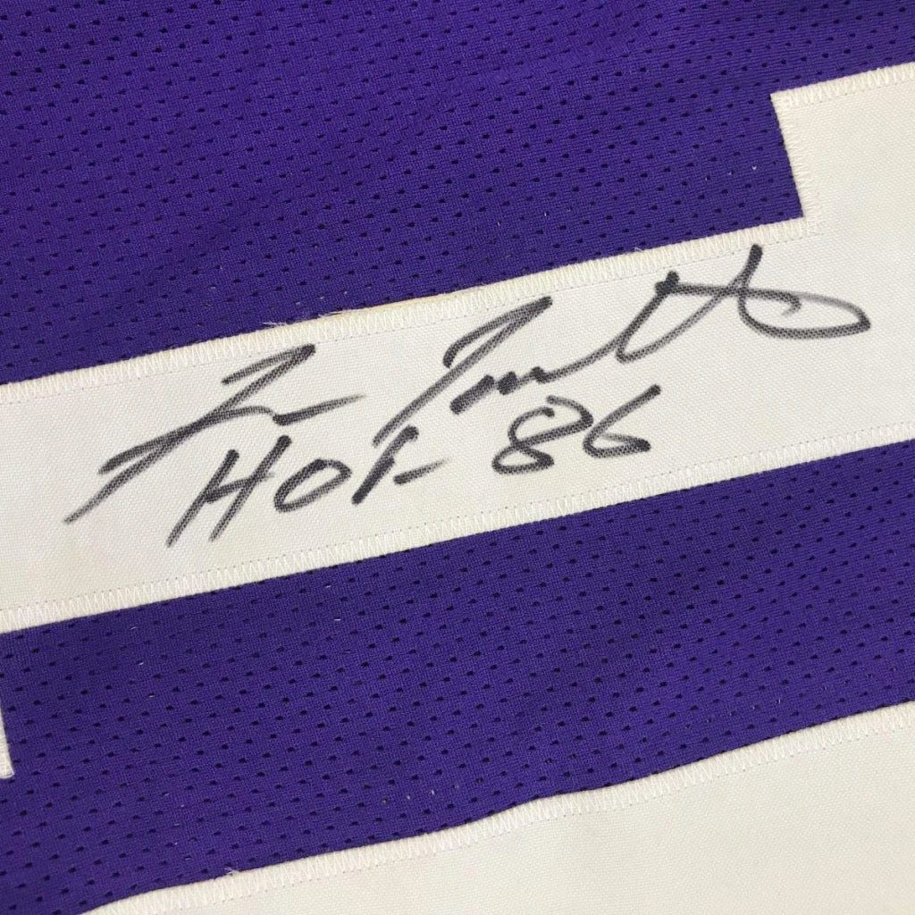 Autographed purple and white custom jersey from a professional sports league collectible