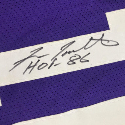 Autographed purple and white custom jersey from a professional sports league collectible