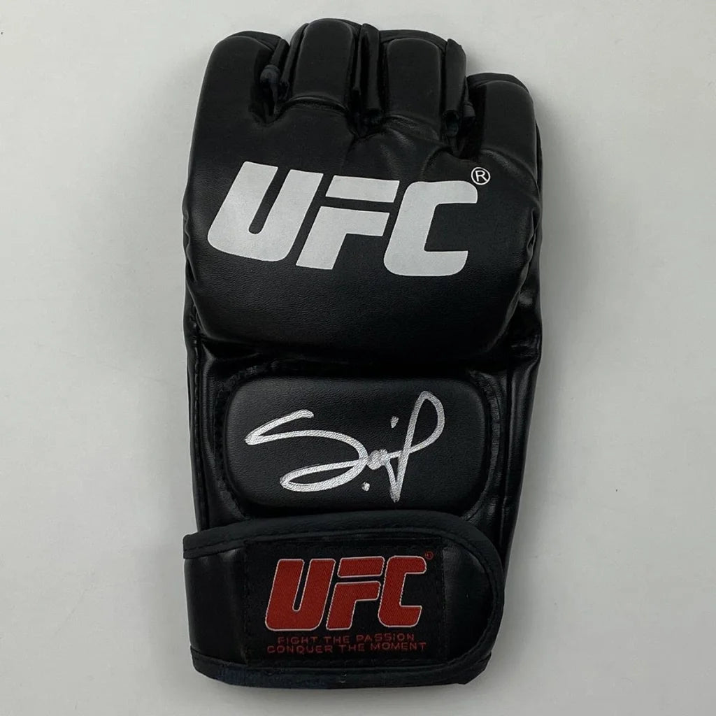 Black UFC MMA glove with white autograph, verified with third party authentication