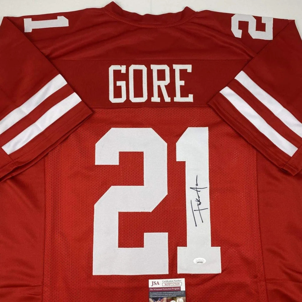 Signed red custom jersey from a professional sports league, perfect for collectors
