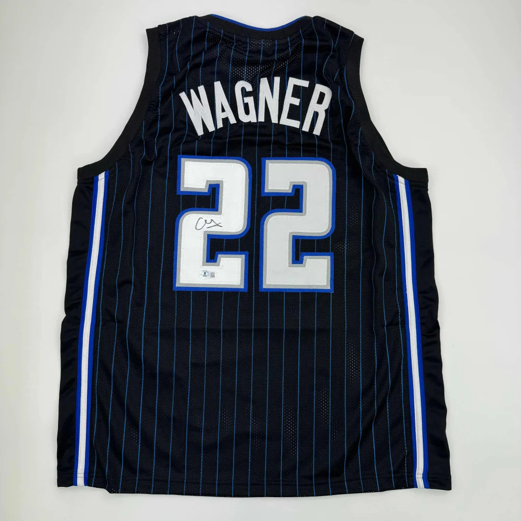 Black and blue striped basketball jersey with WAGNER 22 for Orlando Magic professional sports