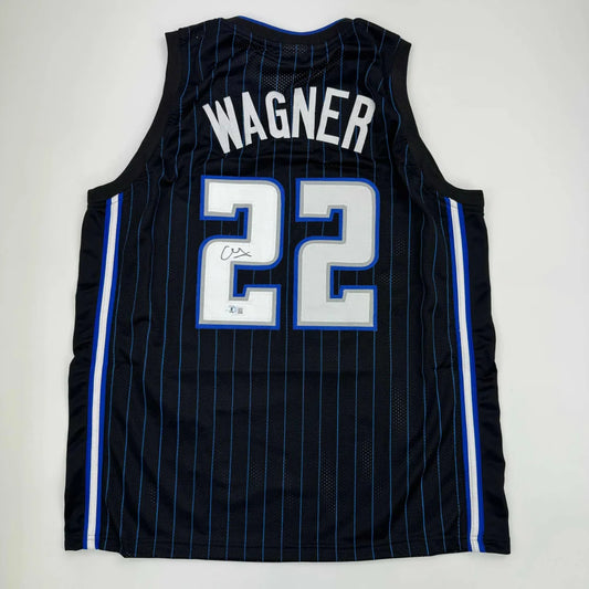 Black and blue striped basketball jersey with WAGNER 22 for Orlando Magic professional sports