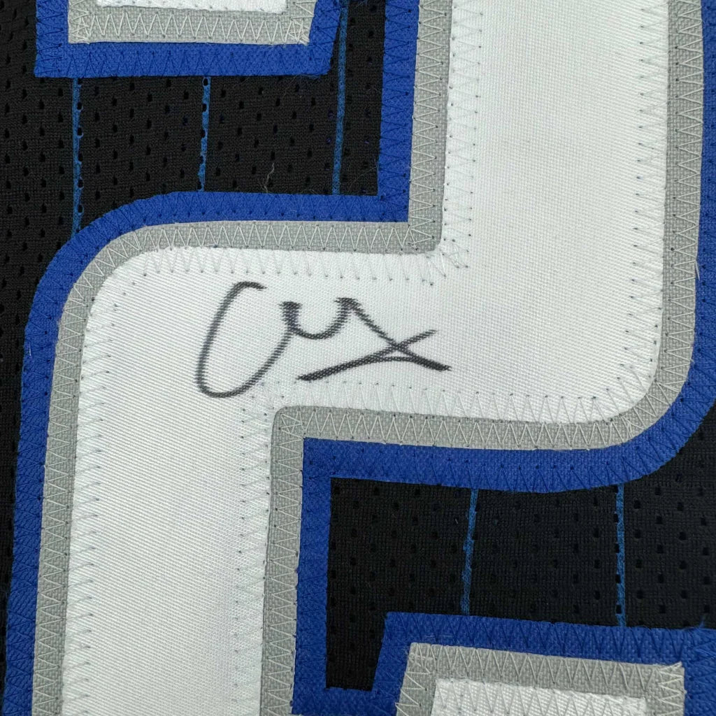 Autographed black, blue, and white professional sports custom jersey for Orlando Magic