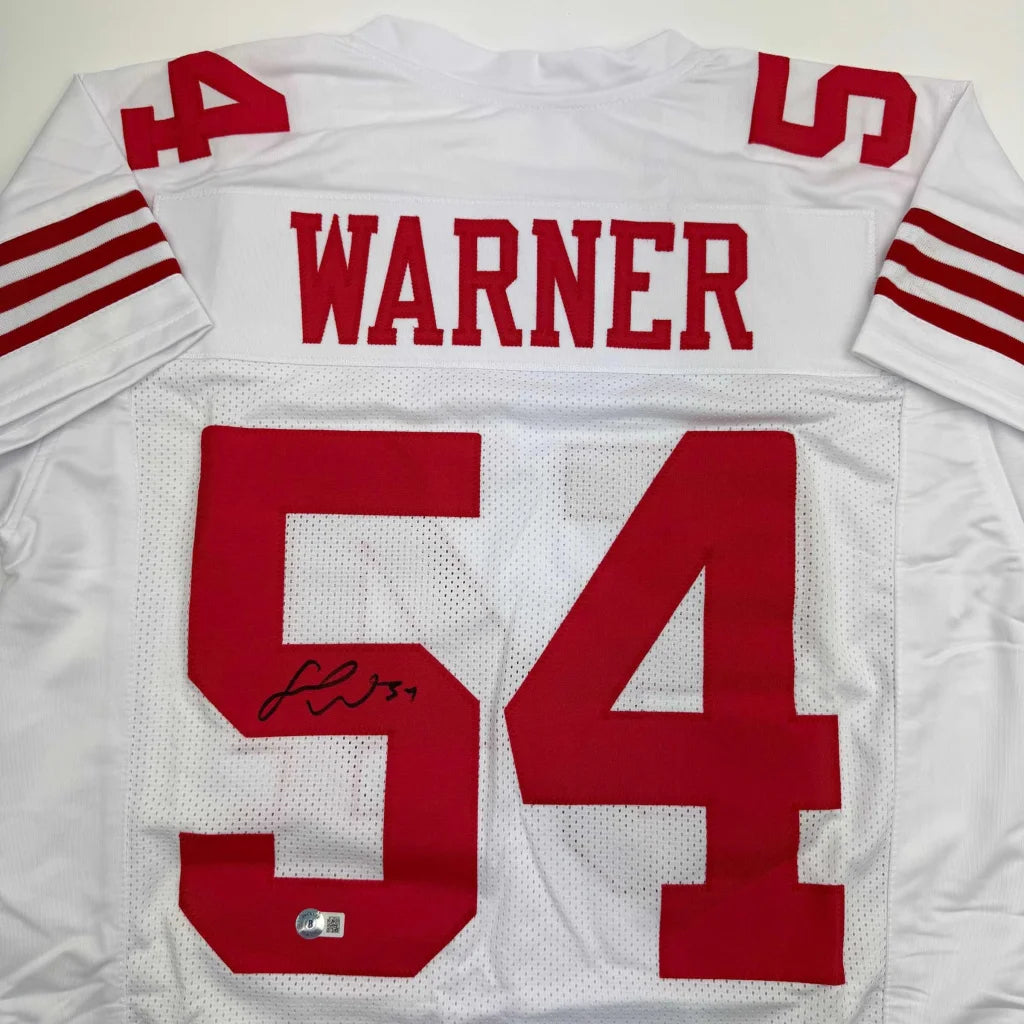 Back of autographed Fred Warner custom jersey, white with red 54, San Francisco pro sports league