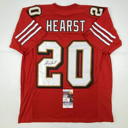 Red custom football jersey with signature, perfect for sports league fans and collectors