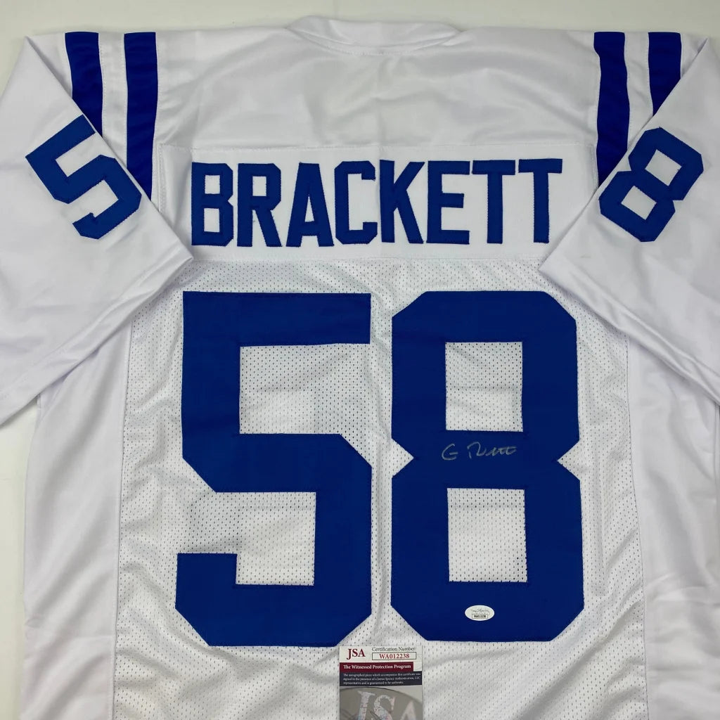 White and blue professional sports custom jersey with brackett 58 and mesh back panel from indianapolis colts