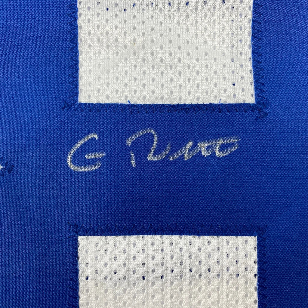Blue and white mesh custom jersey with stitched signature from professional sports league displayed for collectors