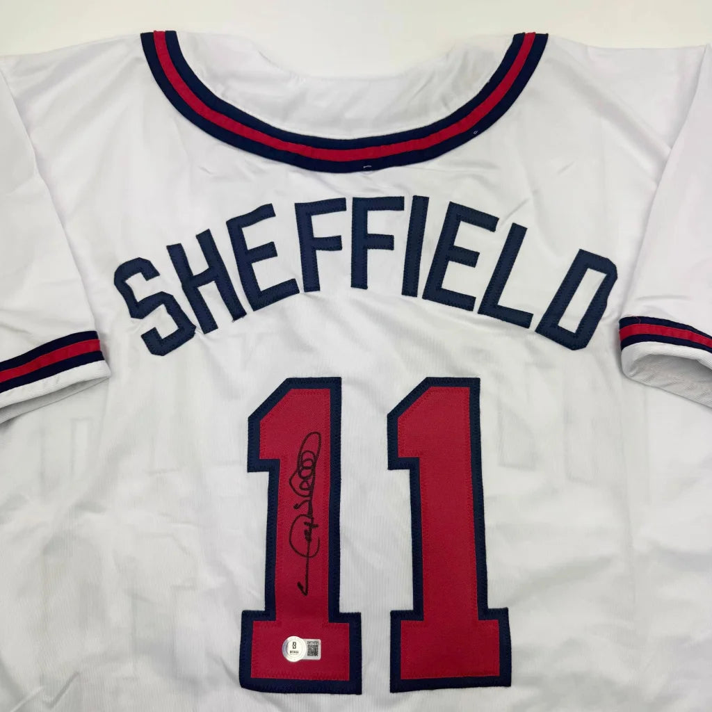 Autographed Gary Sheffield custom Atlanta Braves white jersey with navy red trim, number 11, Beckett COA