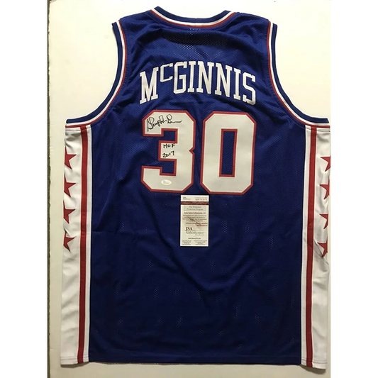 Autographed blue custom jersey from professional sports league with McGinnis 30 on back