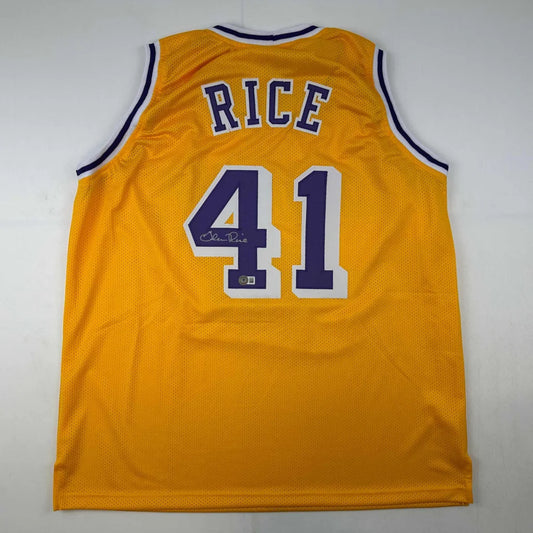 Yellow basketball jersey with RICE 41 in purple and white, perfect for a custom jersey from a professional sports league