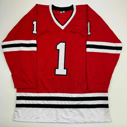 Red hockey jersey with white and black stripes and number 1 for professional sports fans