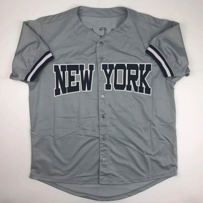Gray custom jersey with NEW YORK across chest, striped sleeves, for professional sports fans