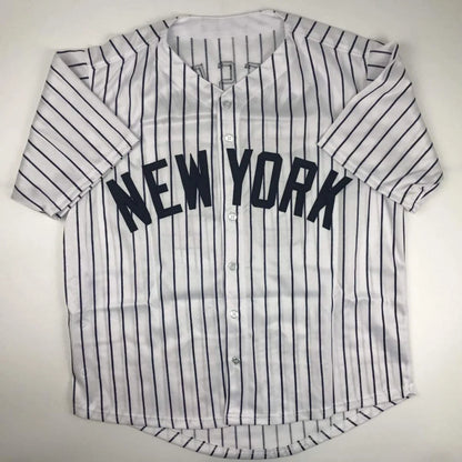 White pinstriped custom jersey with NEW YORK in navy for professional sports fans