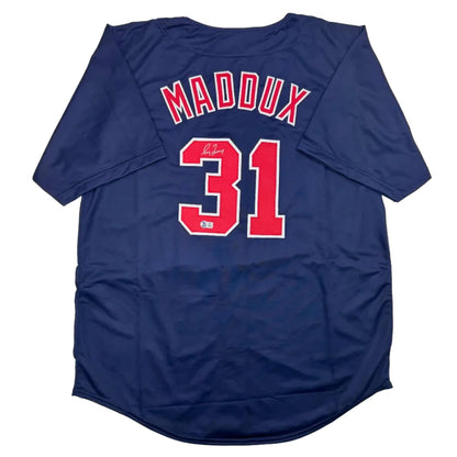 Dark blue Greg Maddux Atlanta professional sports jersey with red Maddux 31 on back