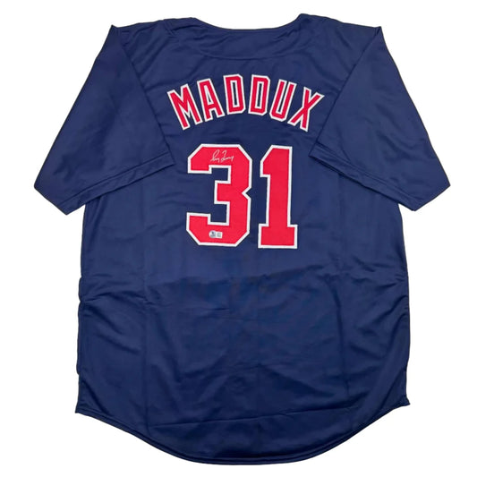 Dark blue Greg Maddux Atlanta professional sports jersey with red Maddux 31 on back