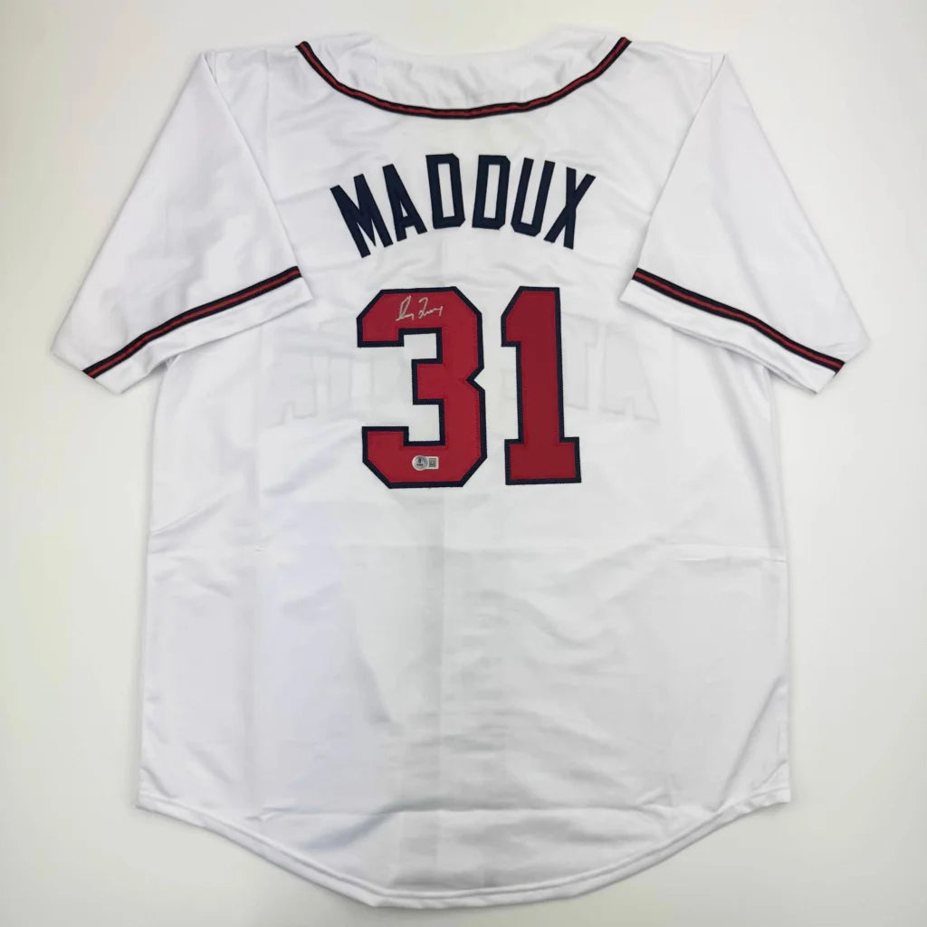 White custom jersey with red and navy trim from Maddux 31 sports league collectible