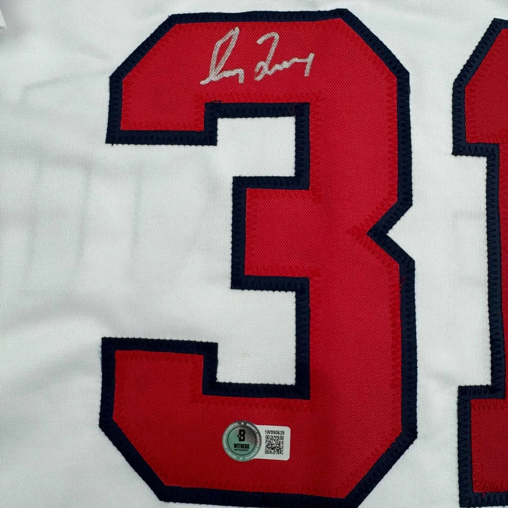 White custom jersey with red 31 number and signature from a pro sports league star