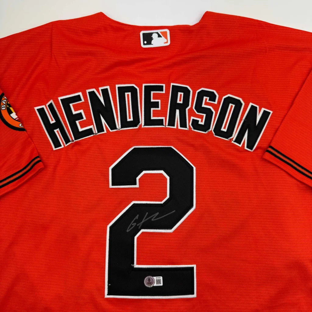 Autographed Gunnar Henderson orange custom jersey, number 2, Beckett COA