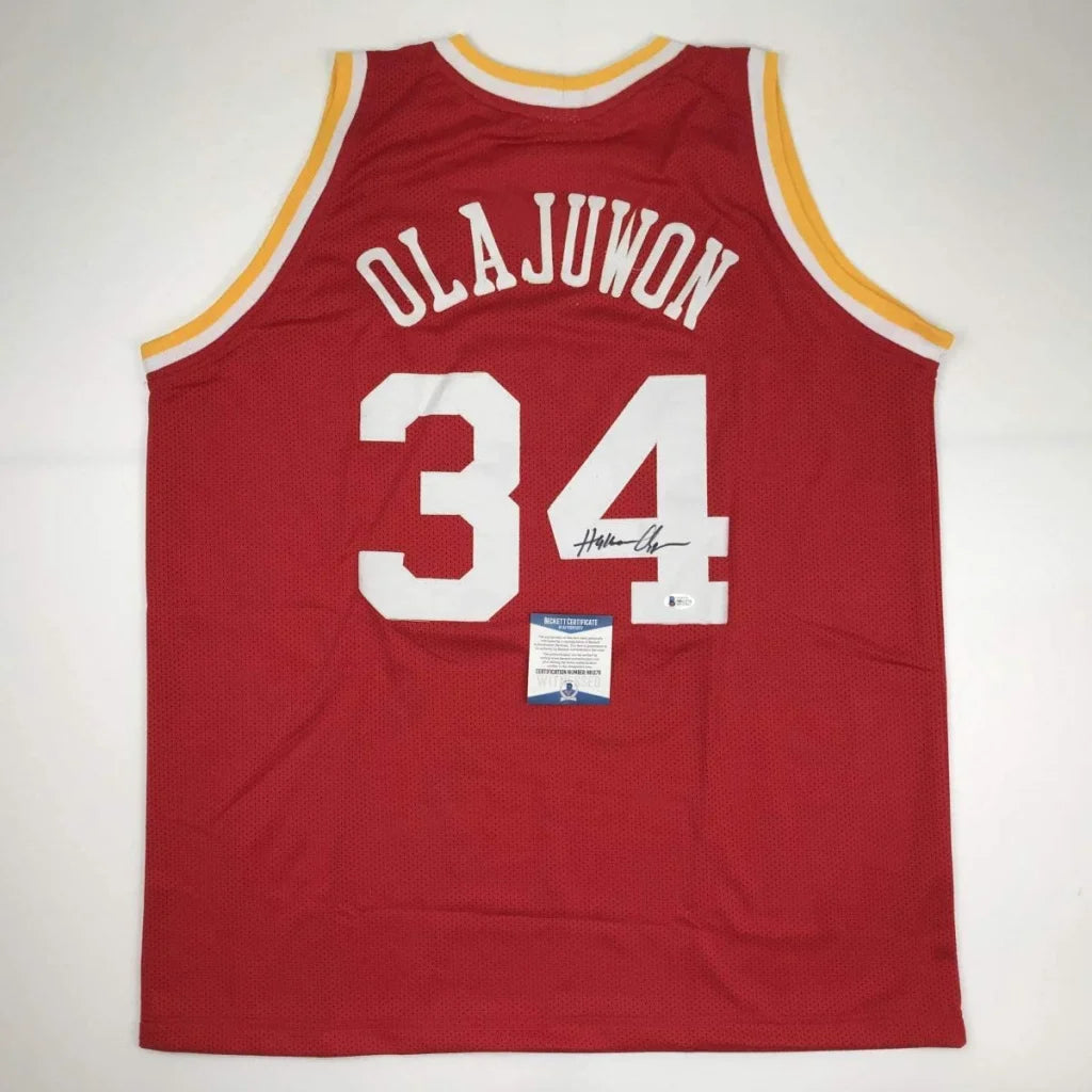 Red basketball jersey with yellow trim and white numbers from Hakeem Olajuwon custom jersey collection