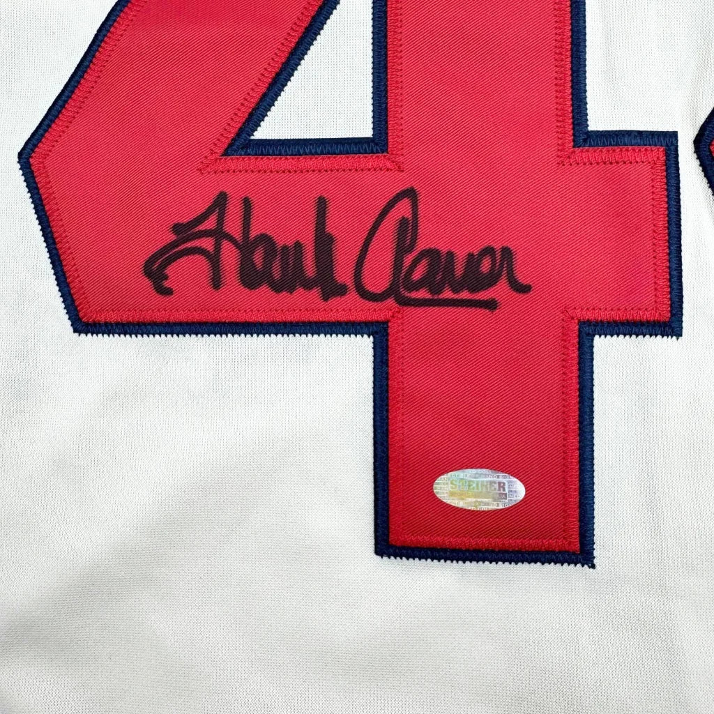 Red and white Hank Aaron custom jersey with signature and authentication sticker for professional sports fans