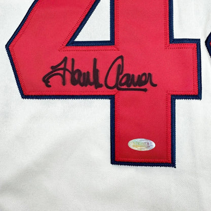 Red and white Hank Aaron custom jersey with signature and authentication sticker for professional sports fans