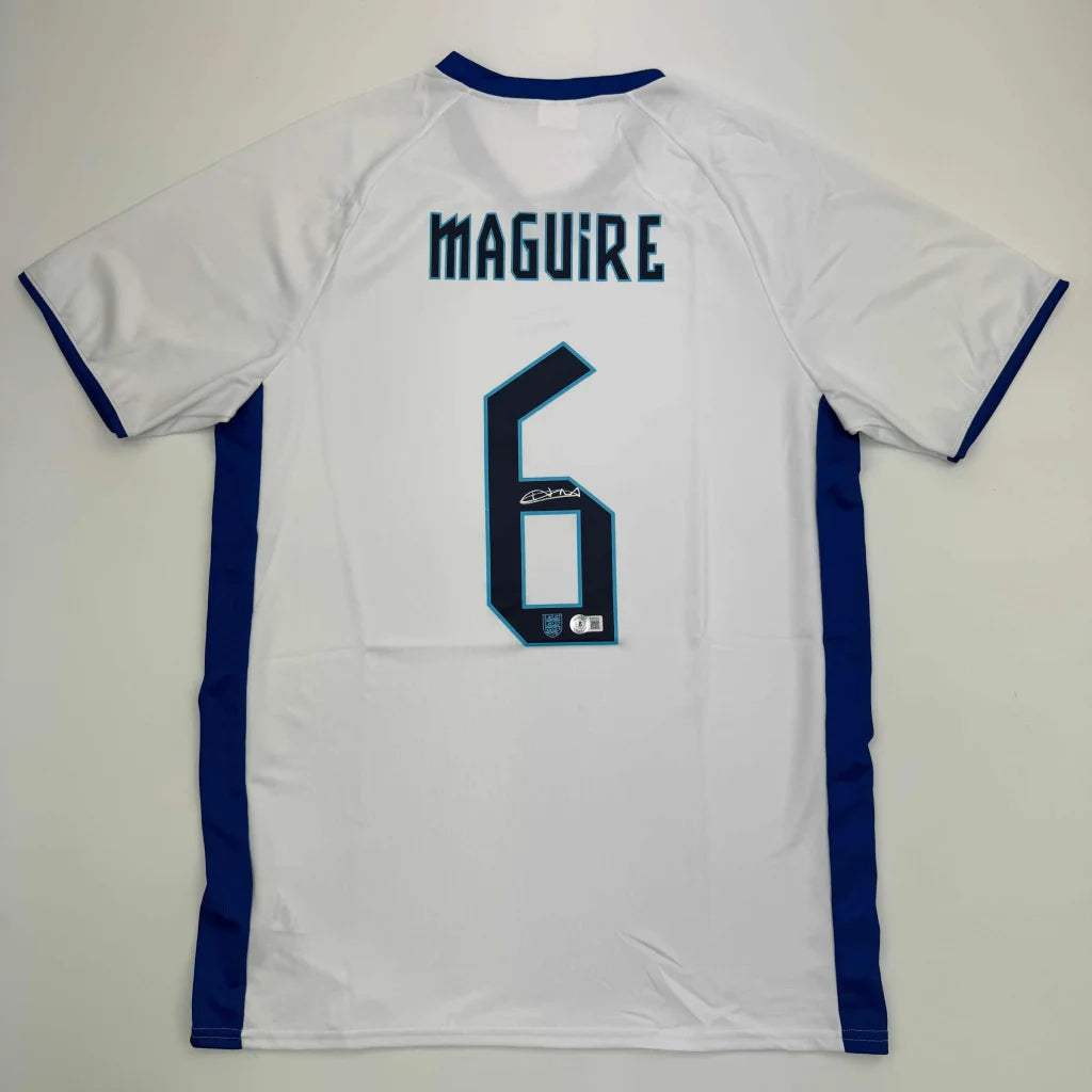 Autographed Harry Maguire England White Soccer Jersey Beckett BAS COA | Hall of Fame Sports Memorabilia | vintageantiquesgifts.com