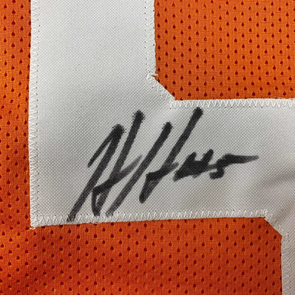 Orange mesh fabric with white patch and black autograph on authentic HOOKER #5 jersey