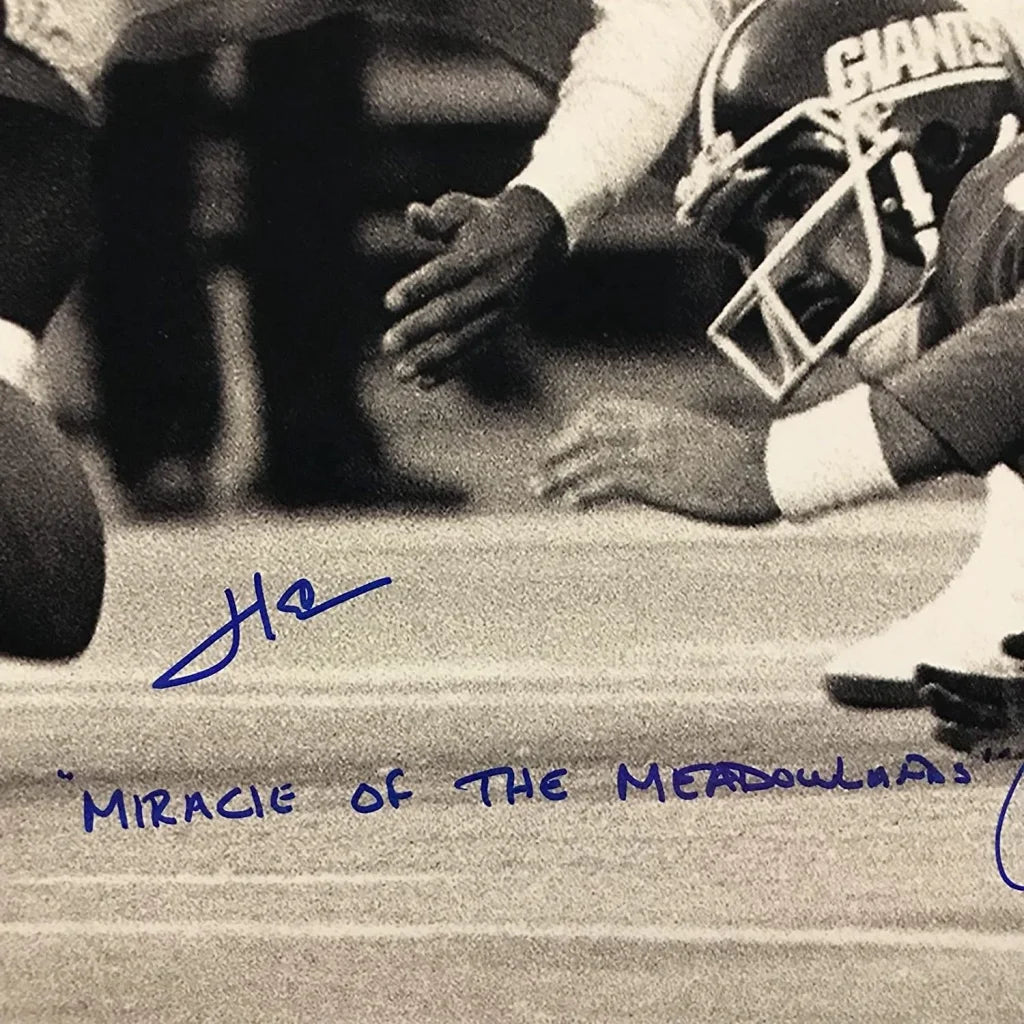 Autographed black-and-white photo of Giants players Herm Edwards and Joe Pisarcik in Miracle at the Meadowlands, JSA COA