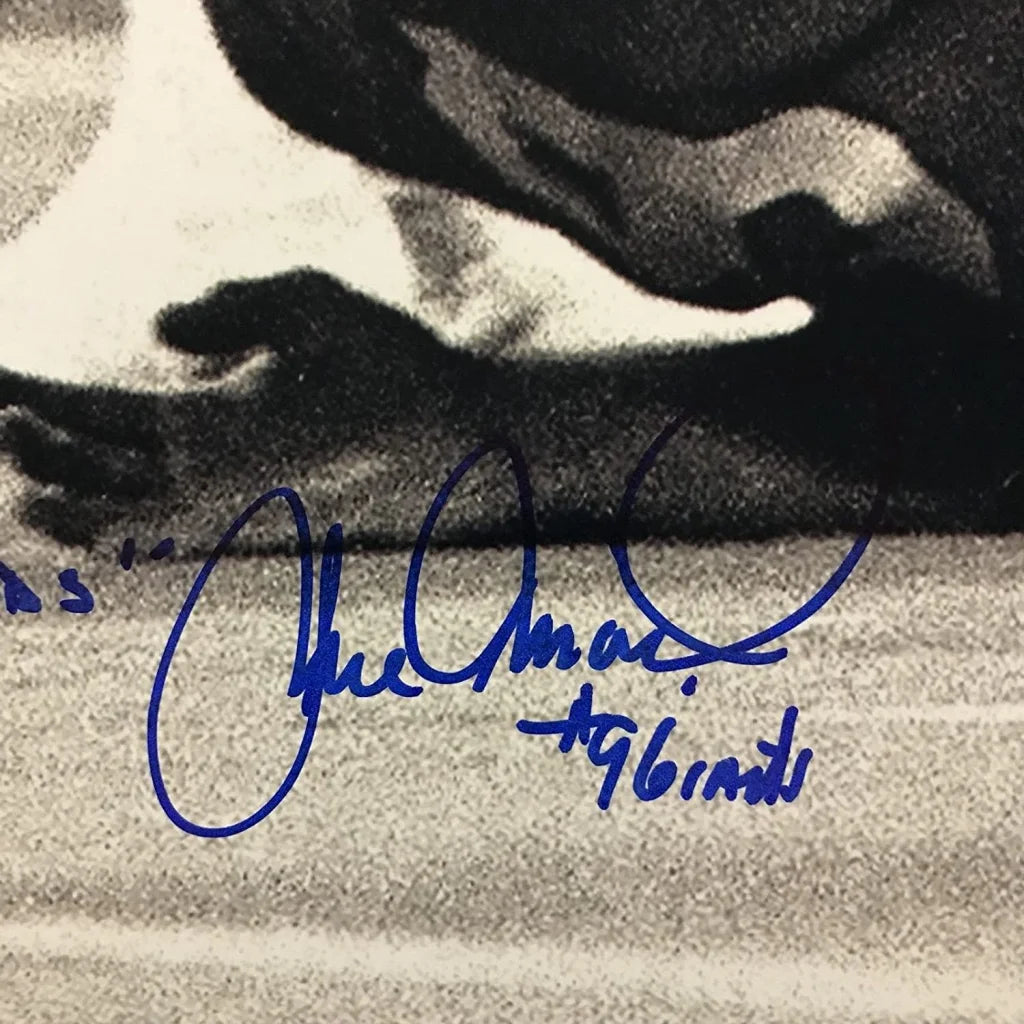 Blue ink signature on black and white photo of Herm Edwards Joe Pisarcik third party product
