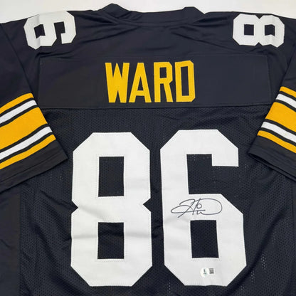 Autographed black professional sports league custom jersey with WARD 86 in yellow and white