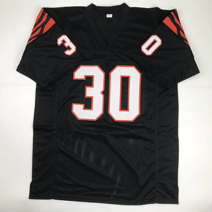 Autographed Ickey Woods custom black Cincinnati jersey with tiger stripes
