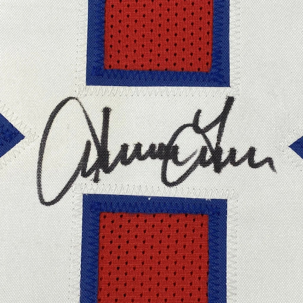 Autographed white custom jersey with red and blue accents from a pro sports league