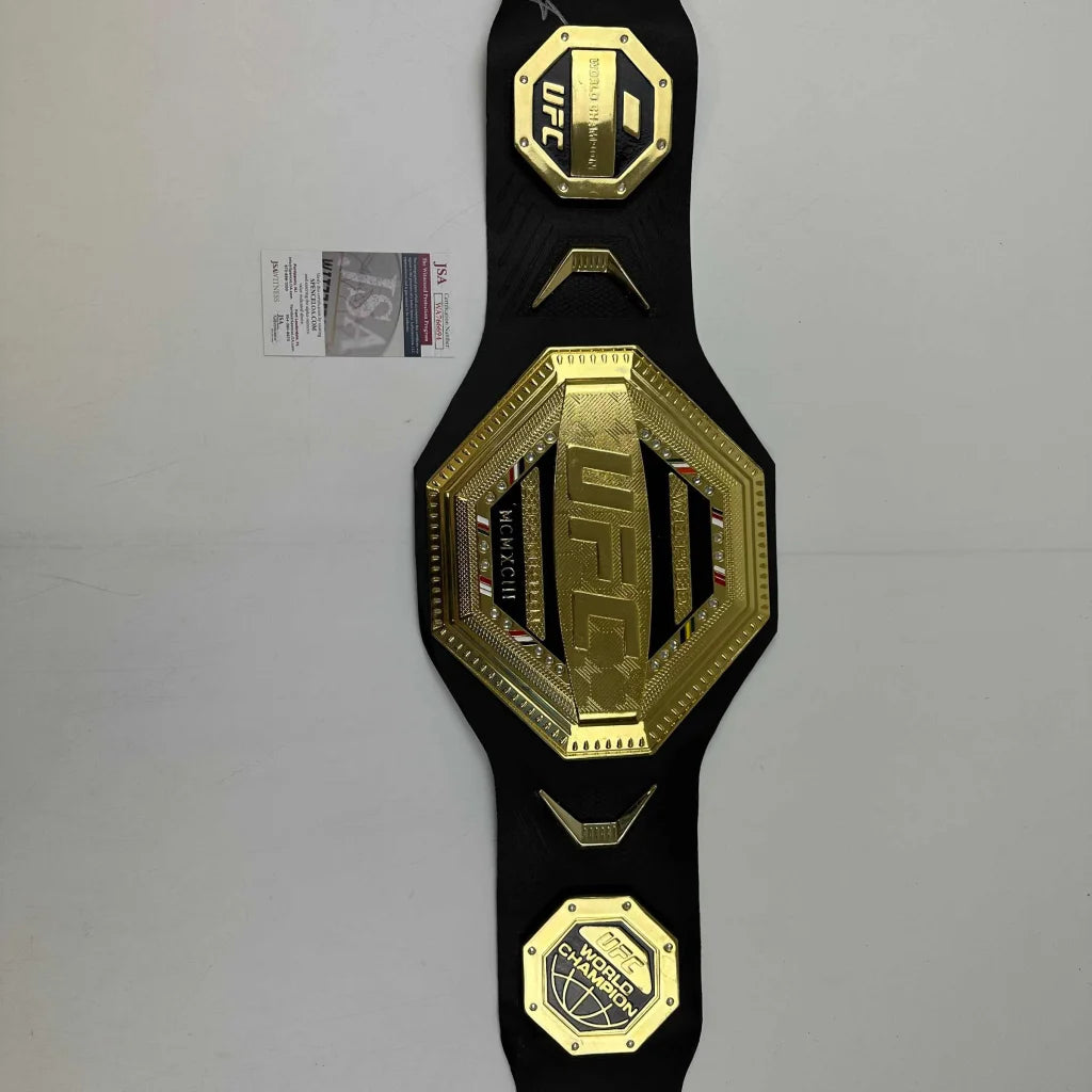 Autographed Israel Adesanya gold-plated black UFC replica championship belt