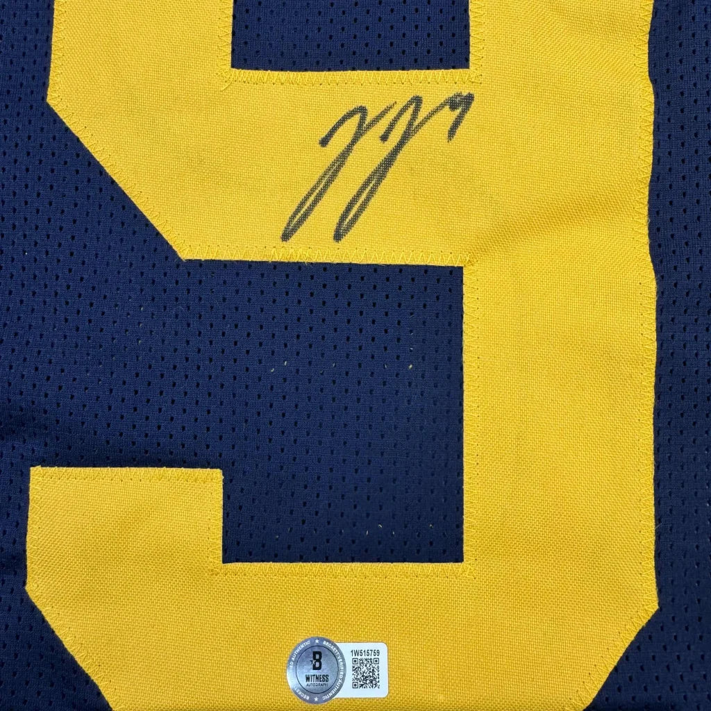 Navy blue custom jersey with yellow numbers and signature for professional sports fans