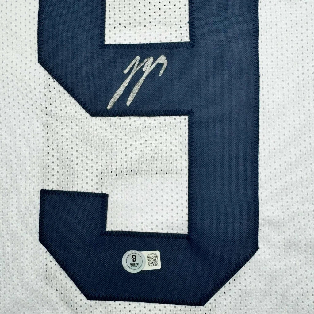 Autographed J.J. McCarthy navy blue number nine custom jersey patch Beckett COA