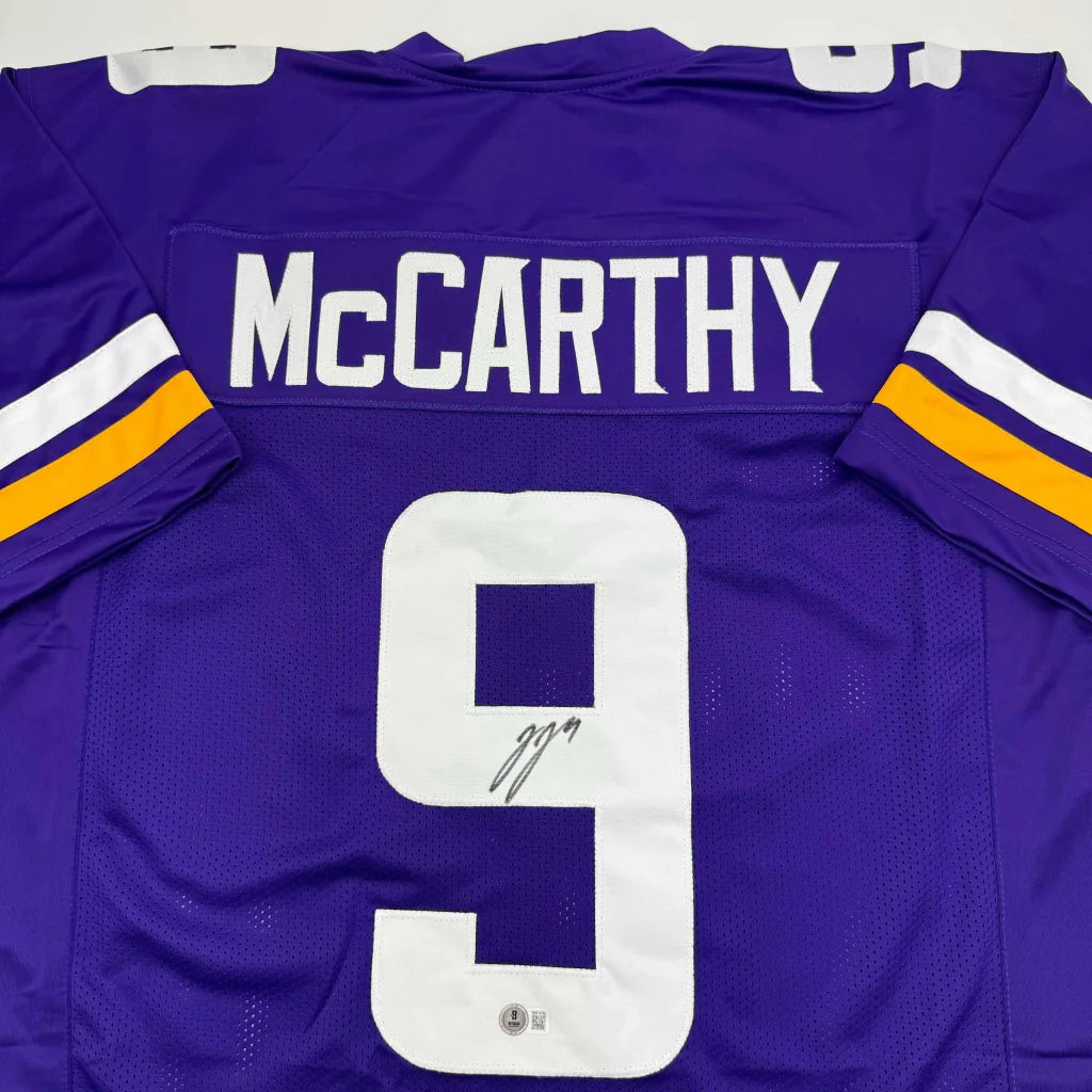 Autographed J.J. JJ McCarthy Minnesota Purple Football Jersey Beckett BAS COA | Certified Authentic Signed Memorabilia | vintageantiquesgifts.com