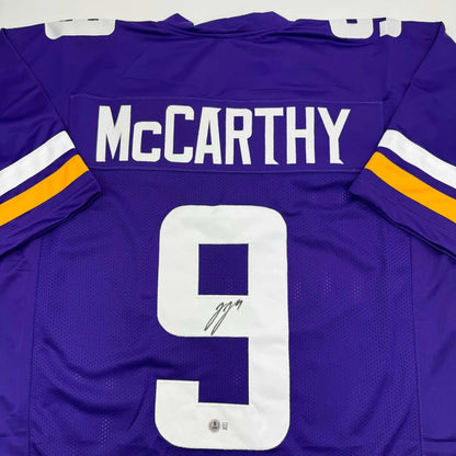 Autographed J.J. JJ McCarthy Minnesota Purple Football Jersey Beckett BAS COA | Certified Authentic Signed Memorabilia | vintageantiquesgifts.com
