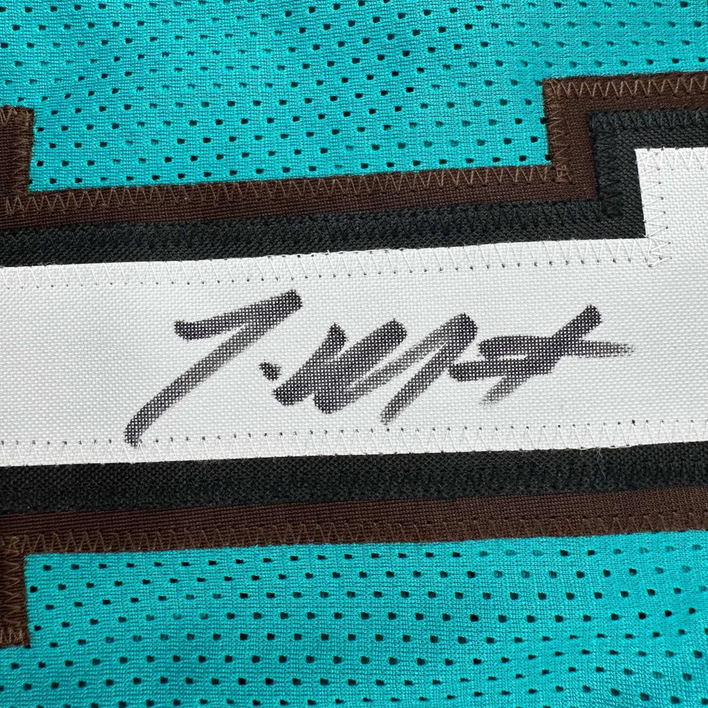 Autographed Morant Memphis Teal Jersey with JSA COA displayed for collectors