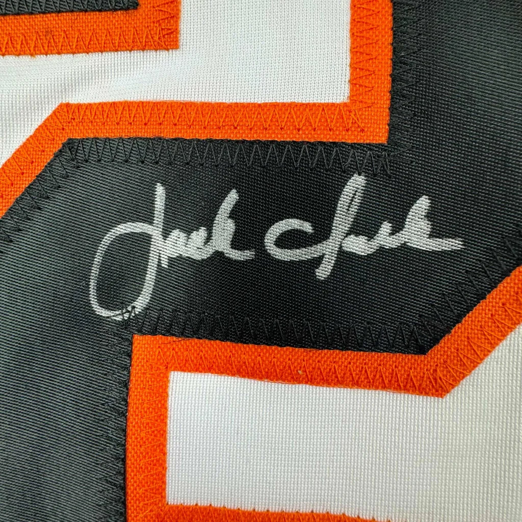 Autographed white and orange custom jersey from a professional sports league collectible