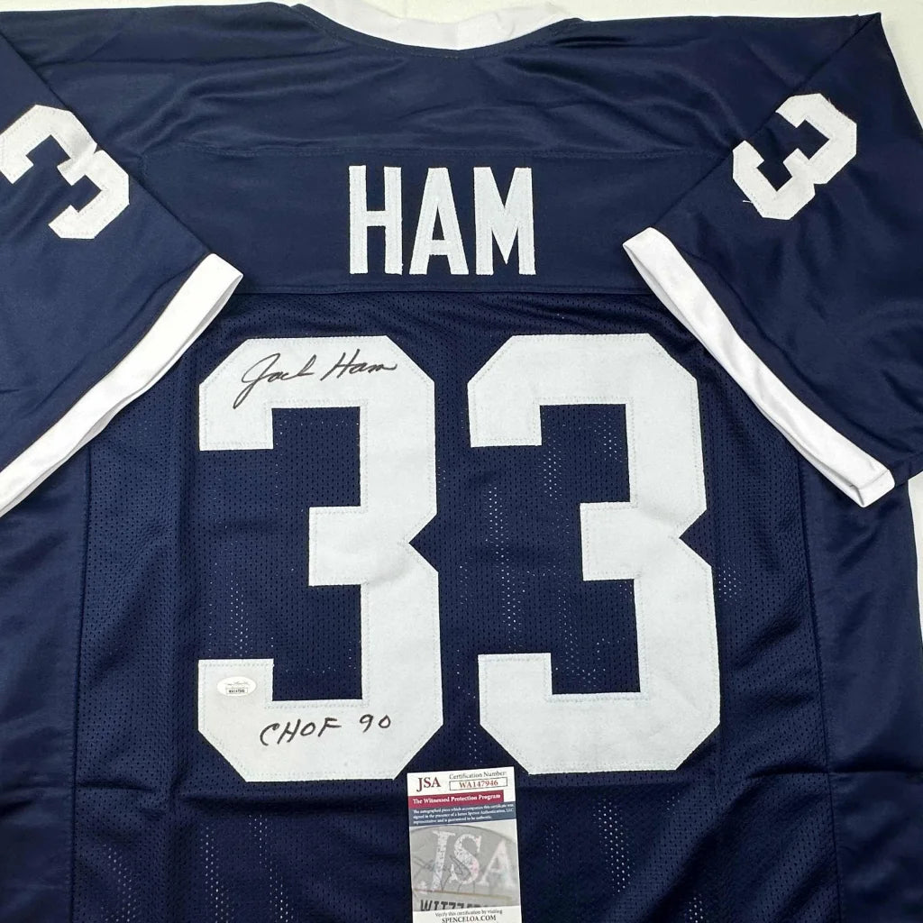 Back of a navy blue custom jersey signed by Jack Ham featuring white lettering and number 33 from professional sports league