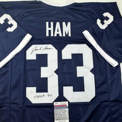 Back of a navy blue custom jersey signed by Jack Ham featuring white lettering and number 33 from professional sports league