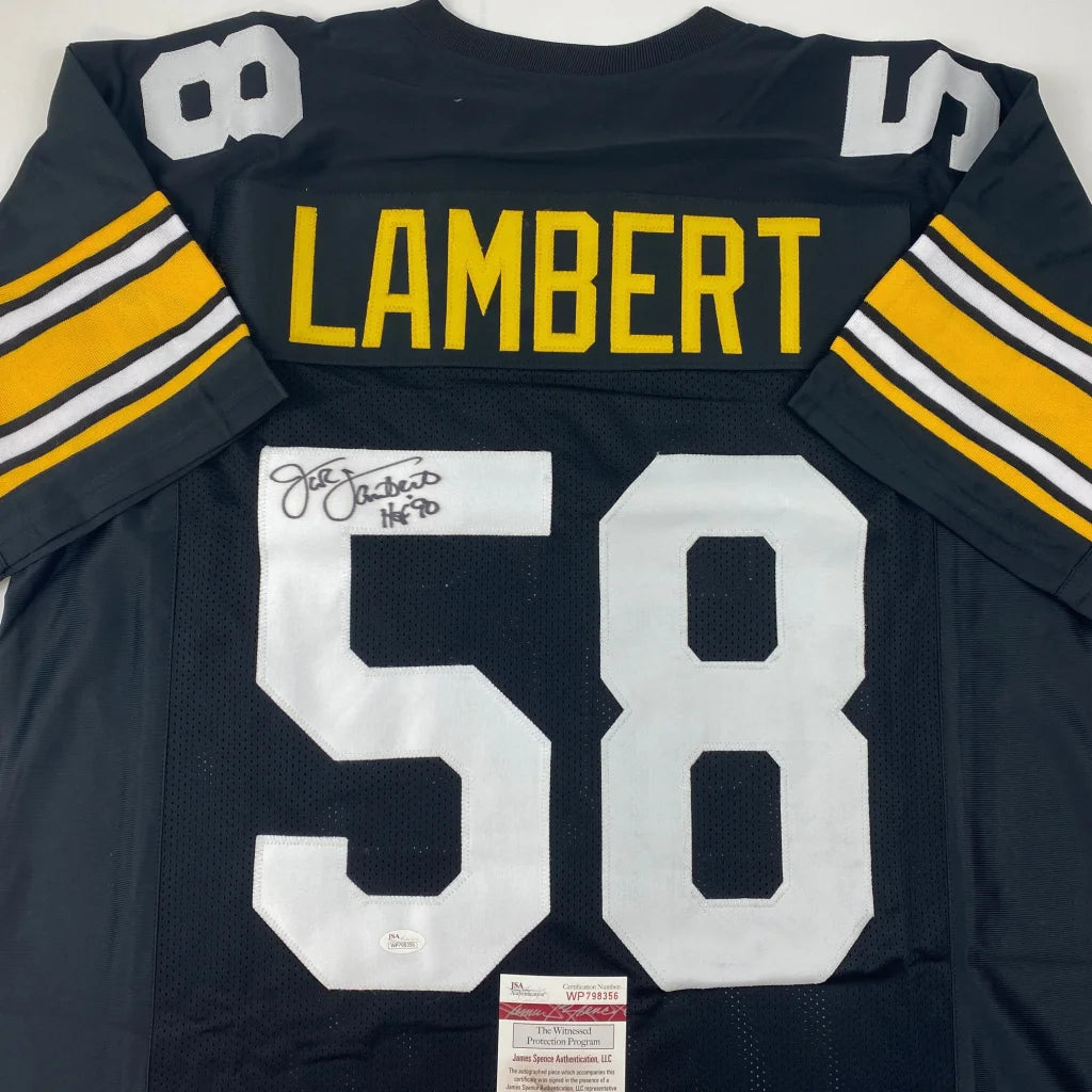 Back of a black autographed Jack Lambert HOF 90 custom jersey with yellow and white lettering and number 58 for professional sports league fans
